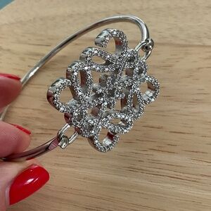 steel bracelet with monogram very fashionable and modern decorated with zircons